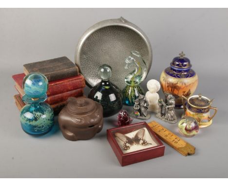 A quantity of collectables. Includes Chinese frog teapot, Mystic Legends figures, books, Noritake, Caithness and Mdina paperw