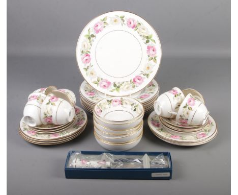 A collection of Royal Worcester dinner and teawares in the Royal Garden Elgar design. Approximately 37 pieces.  