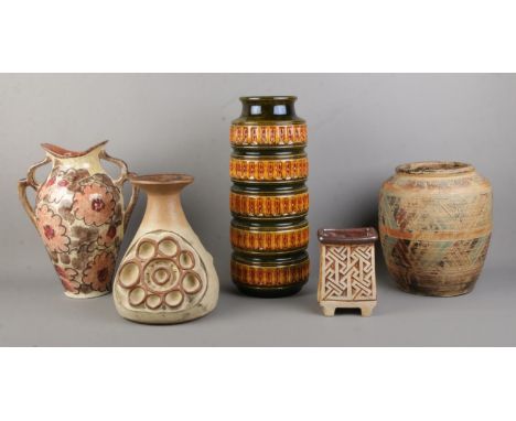 Five assorted pieces of stoneware, to include West Germany cylindrical vase in the 268-40 pattern, shelf pottery vase and Qua