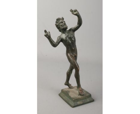 A bronze sculpture of the Roman god Bacchus, raised on stepped base. Height 19cm.  