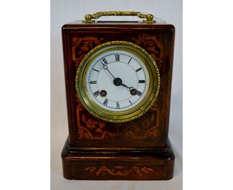 Small 19th century French table clock in an inlaid rosewood case. Back plate engraved Louis Et Miera Paris. Ht 20.5cm