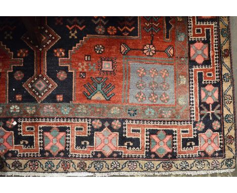 Red &amp; blue ground Middle Eastern carpet 285cm by 163cm