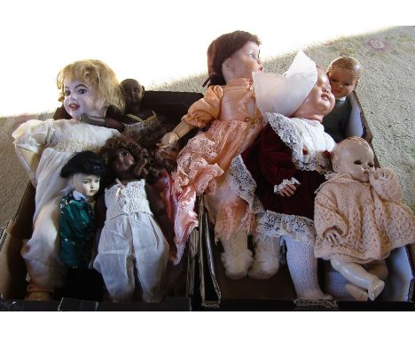 2 boxes of vintage dolls