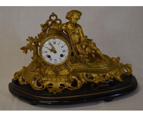 French gilded figural clock depicting a boy with rifle &amp; a brace of partridge on an ebonised base. Makers stamp Rollin A 