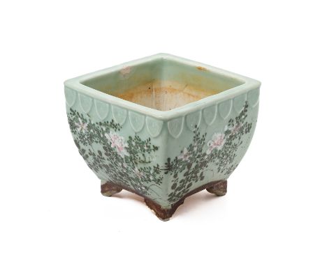 A JAPANESE CELADON GROUND PLANTER
Decorated with floral enamels, on four feet
18cm high x 22cm x 22cm
Condition: Condition Re