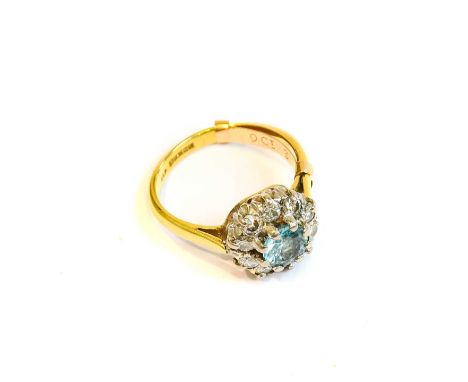 A blue zircon and diamond cluster ring, finger size J1/2 (approximately, ring clip fitted)Condition report: The ring is in go