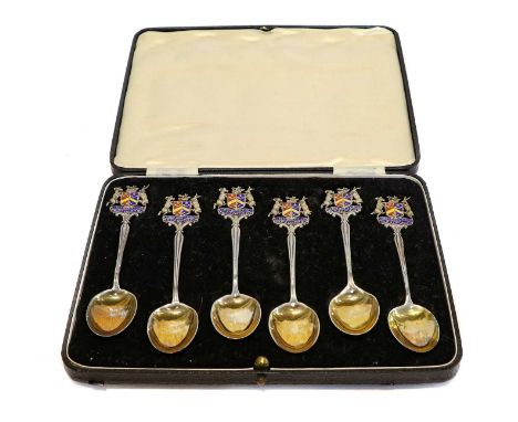 A quantity of silver items, mainly cased including a set of six spoons with enamelled terminals for Bradford with the city cr