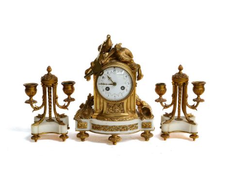 A French gilt metal and marble striking mantel clock with garniture, late 19th century striking on a bell, 25cm (3)