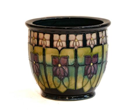 A modern Moorcroft planter, Violets by Sally Tuffin, 16.5cmCondition report: Some glaze crazing, mainly to the underside. Fre