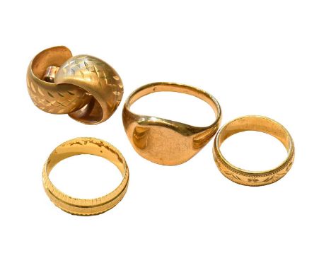 A 9 carat gold band ring, finger size K; a band ring, stamped '750', finger size O; a signet ring, unmarked, finger size T1/2