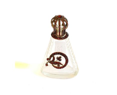 A Gilt-Metal Mounted and 'Gem'-Set Cut-Glass Scent-Bottle, the cut-glass bottle tapering, with the gilt metal mounts set with