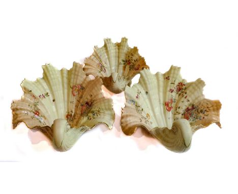 Two large Royal Worcester blush ware shell shaped bowls, two smaller examples, a sandwich plate painted with flowers, a simil