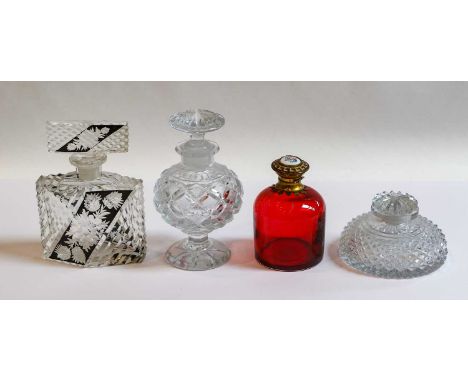 A Pair of Cut-Glass Bottles, one with stopper, the other with associated stopper; Together With: a ruby coloured glass scent-