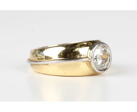 An 18ct gold, platinum and diamond single stone ring, collet set with a circular cut diamond, London 2005, weight 22 .8g, dia