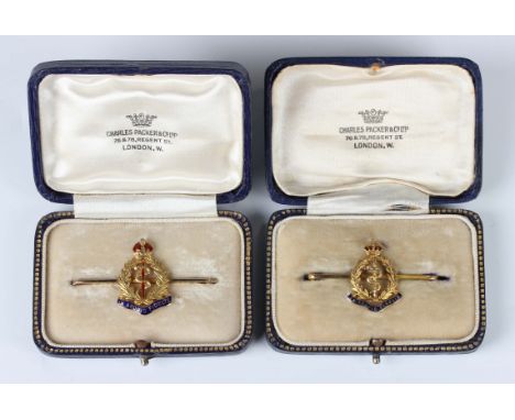 A gold, red and blue enamelled bar brooch, designed as the badge of the Royal Army Medical Corps, detailed '15ct', width 4.8c