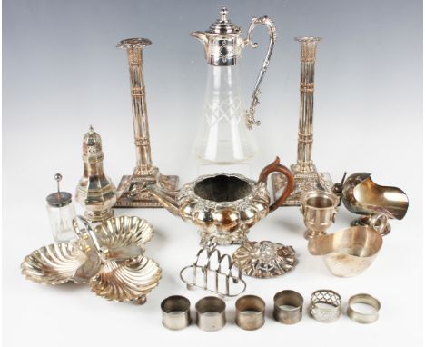 A pair of 19th century Sheffield plate cluster column candlesticks, each on a square base with bellflower garlands, height 31