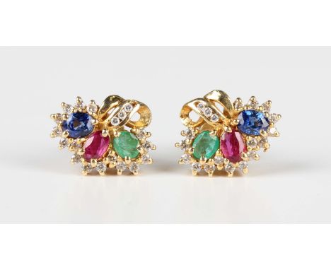 A pair of gold, emerald, ruby, sapphire and colourless gem set earrings, each mounted with a single oval cut emerald, ruby an