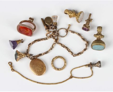 A Victorian gold chain, fitted with a bloodstone fob, a paste fob, a small oval locket, a watch key and an oval pendant locke