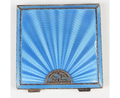 A George V silver and blue enamelled square compact, the front decorated in marcasite with initials 'EC', Birmingham 1933 by 