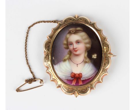A late Victorian gold mounted oval porcelain brooch, painted as a portrait of a lady within a shaped oval surround, unmarked,