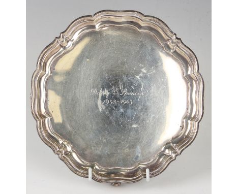 A George V silver card salver, inscription engraved within a piecrust rim, on scroll feet, Sheffield 1918 by Harrison Brother