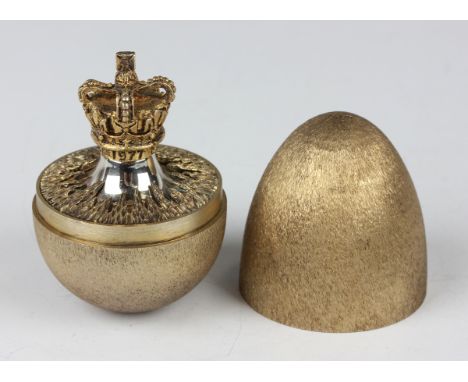 An Elizabeth II Stuart Devlin silver gilt novelty surprise egg, limited edition No. 161, of ovoid form with matt textured dec