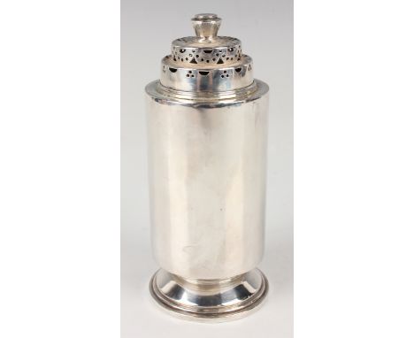 A George V silver cylindrical sugar caster with pierced stepped lid, on a circular foot, London 1935 by Goldsmiths &amp; Silv