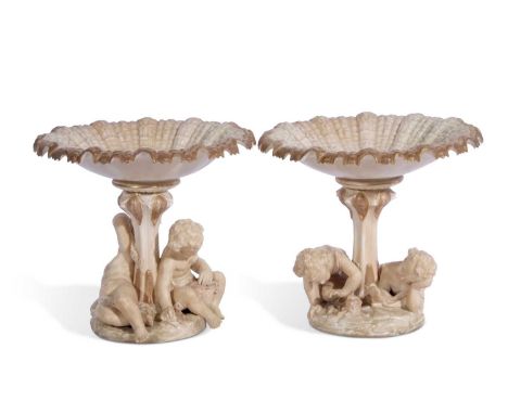 Pair of Royal Worcester figural comports or tazzas the column modelled with children, 19cm high (2)