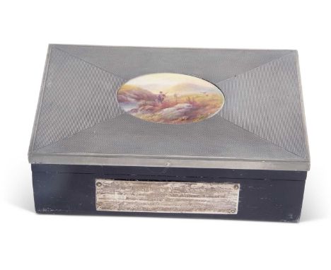 Black painted box with silver and metal top in Art Deco style enclosing a small porcelain painted oval plaque of a Highland h