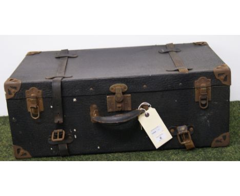 A vintage bound suitcase with metal corners and leather straps, together with 3 other vintage suit cases and a tin trunk