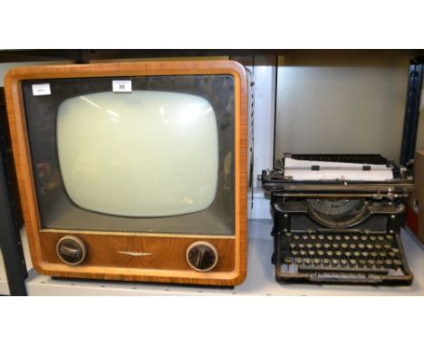 Vintage Defiant TV set, together with a cast metal typewriter 