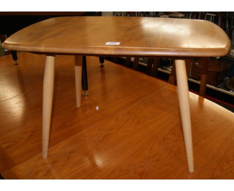 An Ercol Blonde coffee table, label affixed to the underneath