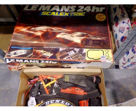 Scalextric 24hr Le Mans boxed set (unchecked) with spare box of mixed track and accessories. Not available for in-house P&amp