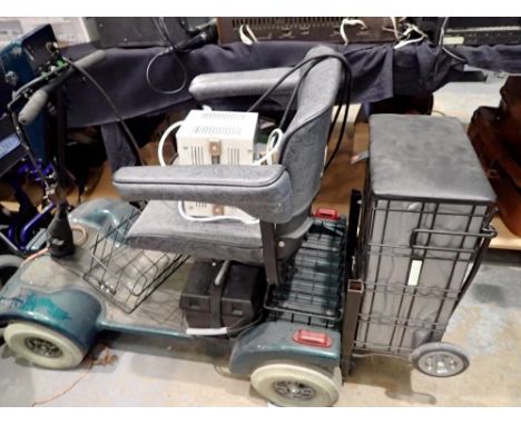Lark 4 mobility scooter with charger. All electrical items in this lot have been PAT tested for safety and have passed. This 