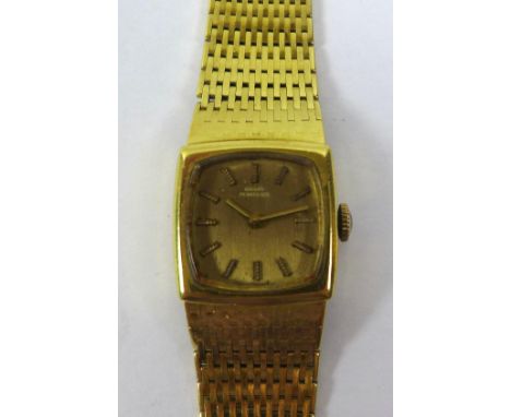 An 18ct gold Girard Perregaux lady's wristwatch, circa 1978, with textured link 18ct gold strap, the dark gold rounded square