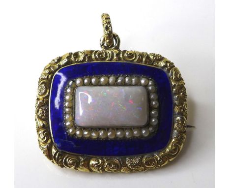 A late 19th century mourning brooch set with a central opal, surrounded by seed pearls and blue enamel border with gilt metal