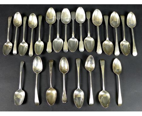 A group of Georgian and later desert spoons, mostly Hanoverian and Old English pattern, some with terminals engraved, includi