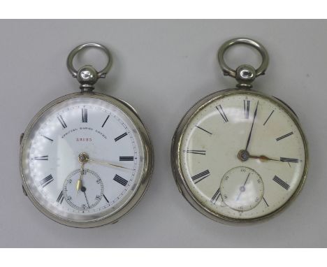 Two Victorian silver cased key wound pocket watches, both with white enamel dials, black Roman numeral dials, subsidiary seco