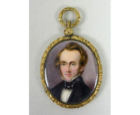A Victorian oval portrait miniature, half length, depicting a Victorian gentleman with blue cravat, white shirt and black jac