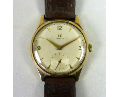 An Omega 9ct gold cased gentleman's wristwatch, circa 1955, model 13322, circular silvered dial with Arabic and arrow baton n