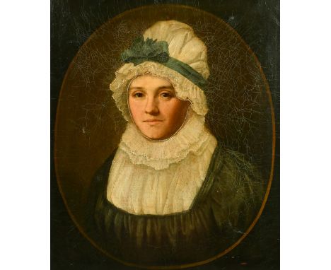 Late 18th Century, a head and shoulders portrait of a lady in a bonnet, painted as an oval, oil on canvas, 24" x 20" (61 x 51