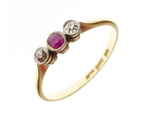 Ruby and diamond three stone ring, the shank stamped '18ct Plat', size T½, 2.6g gross approx