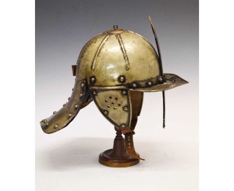 A good copy of a Cromwellian period 'Lobster Tail' helmet, the skull formed in one piece with six radial ridges and small sus