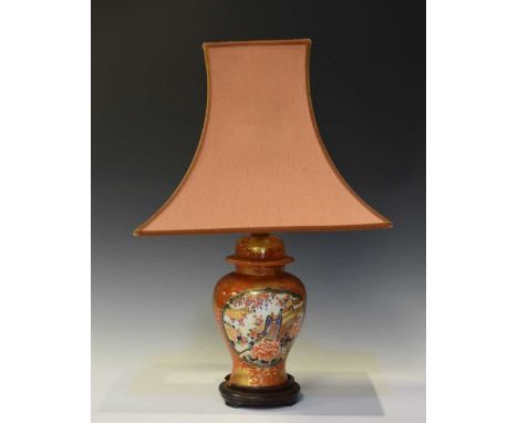 Japanese Kutani style lamp on fixed wooden base and pink shade, 56cm high 