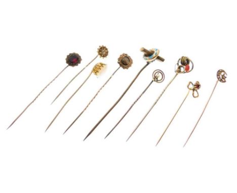 Group of nine assorted stick pins, all unmarked (9)