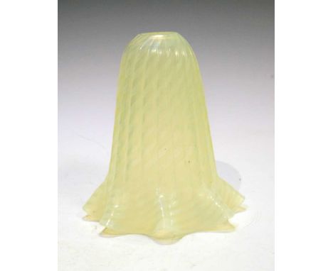 Victorian vaseline glass lamp shade, of fluted bell form with wavy edge, 17.5cm high approx.The piece has several imperfectio