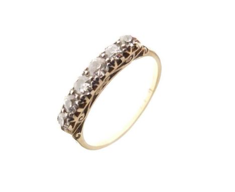 Half eternity ring, claw set six old-brilliant cut diamonds, the shank stamped '18', size R, 2.8g gross approx
