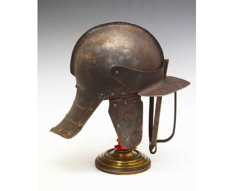 Copy of a Cromwellian period 'Lobster Tail' helmet, possibly for re-enactments, one piece skull with hinged visor with three 