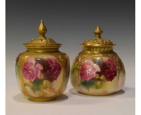 Royal Worcester - Two pot pourri vases and covers, gilded and painted with roses, printed puce backstamps, 11cm high