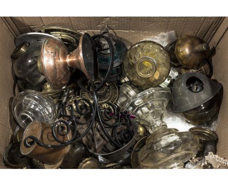 A box containing oil lamp parts